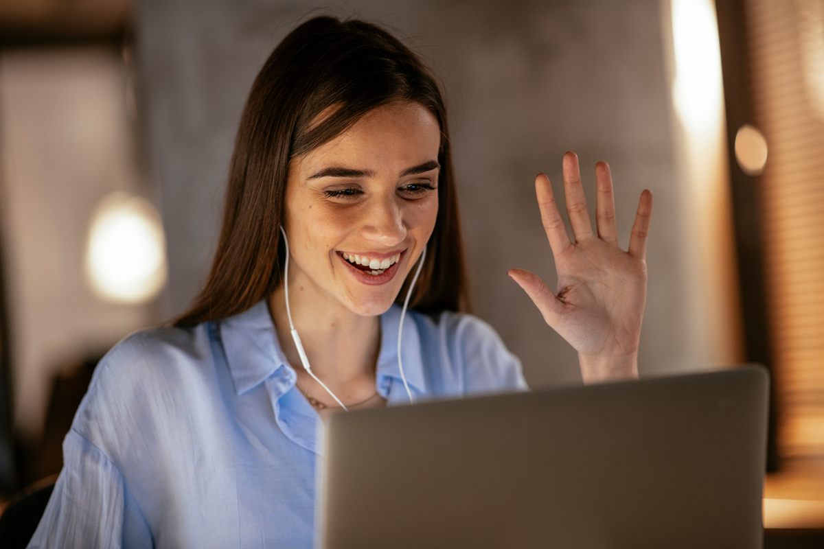 Friendly professional on a video call ready to help